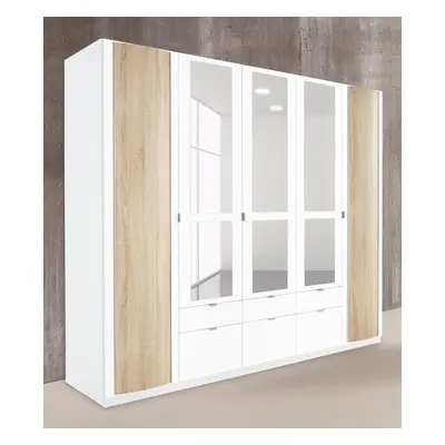 priess Kleiderschrank mit gerundeten Elementen auf den Aussentüren